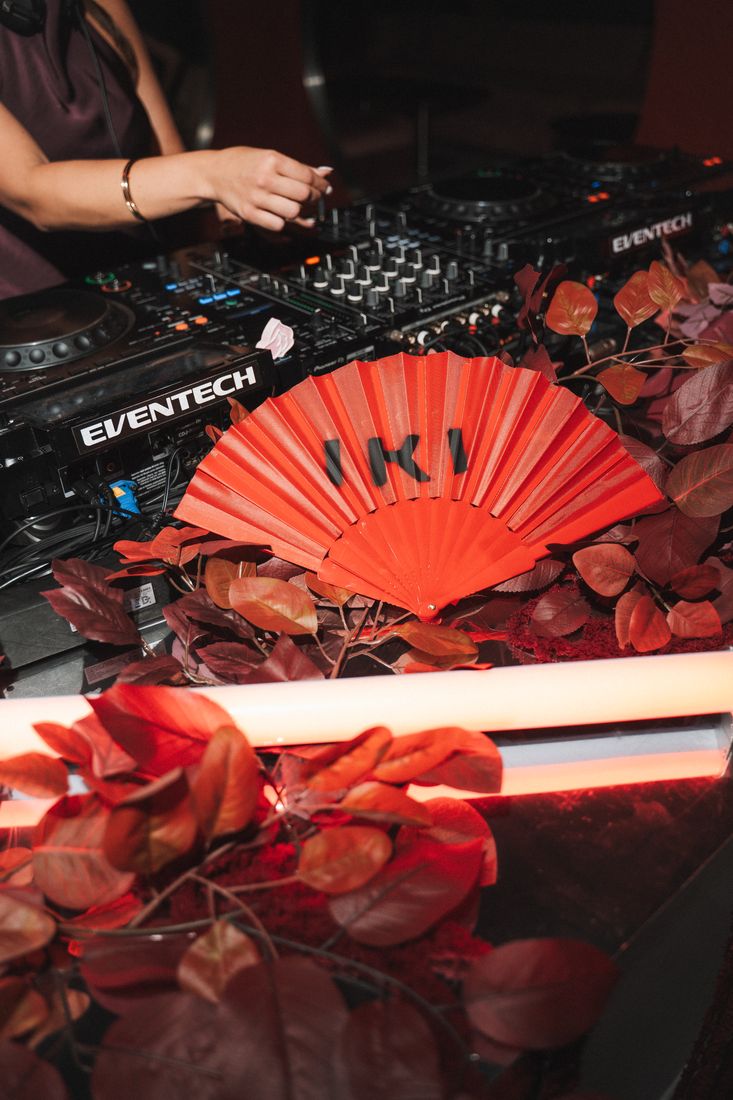 Red IKI fan on the DJ booth